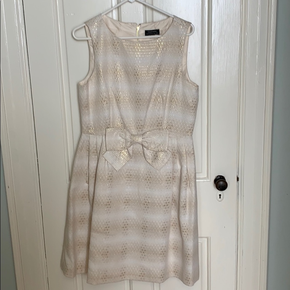 Cream colored with gold accents